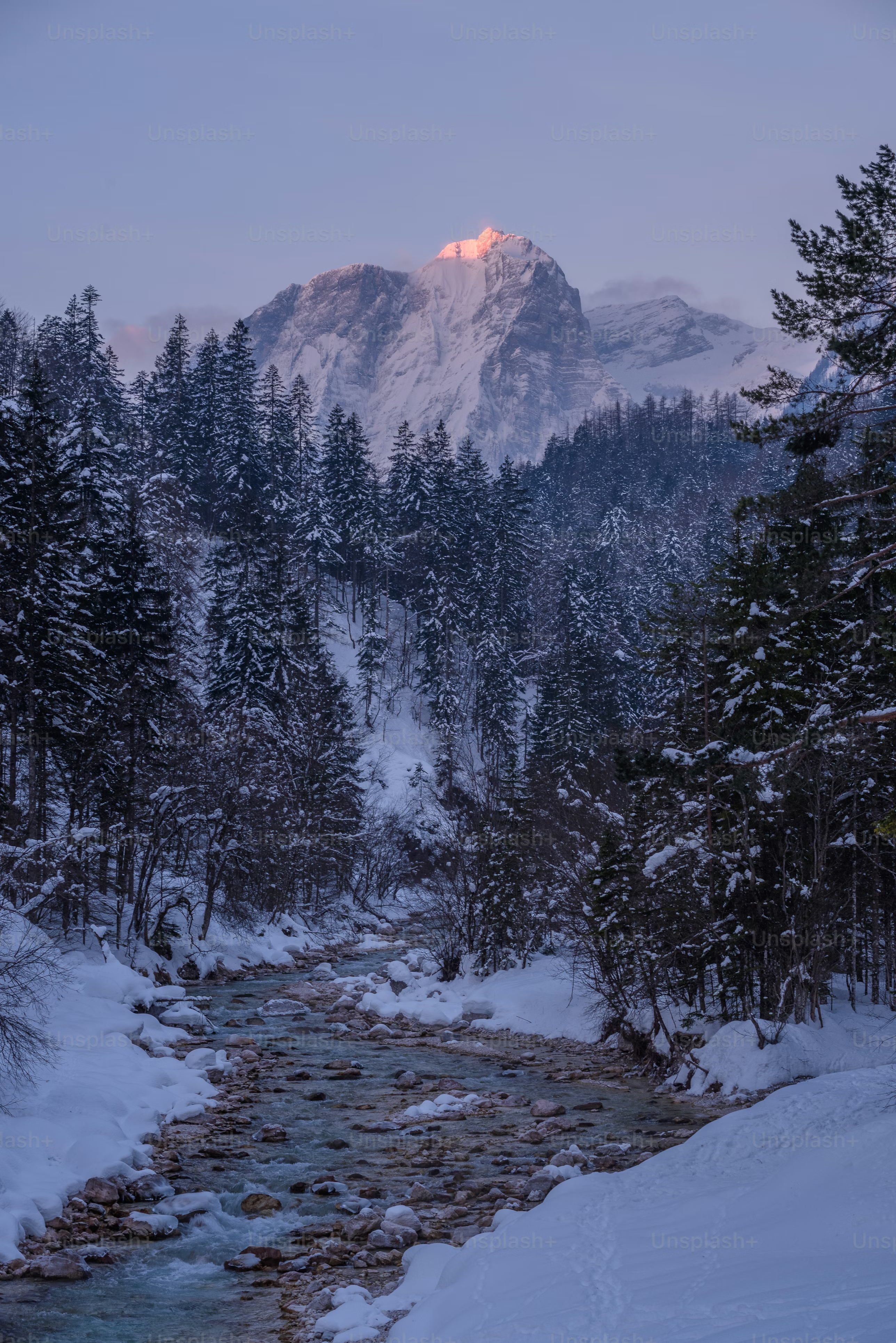 Snow covered mountain range during daytime